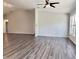 Spacious living room with large windows and high ceilings at 5930 Precious View Ct, New Port Richey, FL 34655