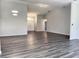 Open living room with high ceilings and neutral colors at 5930 Precious View Ct, New Port Richey, FL 34655