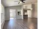 Open concept living room with kitchen and dining area views at 5930 Precious View Ct, New Port Richey, FL 34655