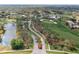 Aerial view of community entrance and golf course at 2241 Merion Ct, Spring Hill, FL 34606