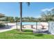 Inviting community pool with ample seating and shade structures at 2241 Merion Ct, Spring Hill, FL 34606