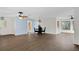 Open concept dining area with laminate flooring and access to the kitchen at 2241 Merion Ct, Spring Hill, FL 34606