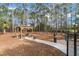 Dog park with shaded seating and waste disposal at 2241 Merion Ct, Spring Hill, FL 34606