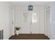 Bright entryway with double doors and wood floors at 2241 Merion Ct, Spring Hill, FL 34606