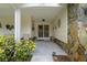Inviting front porch with double doors and stone accents at 2241 Merion Ct, Spring Hill, FL 34606