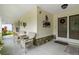 Relaxing front porch with wicker chairs and a view of the lawn at 2241 Merion Ct, Spring Hill, FL 34606