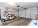 Garage with golf cart and ample space for storage at 2241 Merion Ct, Spring Hill, FL 34606