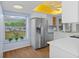 Updated kitchen with stainless steel appliances and skylight at 2241 Merion Ct, Spring Hill, FL 34606