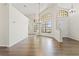 Bright dining area with hardwood floors and large windows at 9131 Haas Dr, Hudson, FL 34669