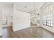 Bright dining room with hardwood floors and a chandelier at 9131 Haas Dr, Hudson, FL 34669