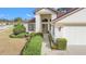 Inviting front entrance with well-maintained landscaping and walkway at 9131 Haas Dr, Hudson, FL 34669
