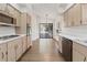 Kitchen with stainless steel appliances and wood cabinets at 9131 Haas Dr, Hudson, FL 34669