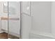 Shower stall with tiled walls and seat at 9131 Haas Dr, Hudson, FL 34669