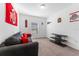 Spacious living room with grey couch and TV stand at 12931 Conquistador Loop, Spring Hill, FL 34610