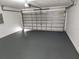 Attached garage with an automatic door opener at 6075 Shingler Ave, Spring Hill, FL 34608