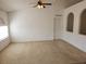 Bright living room with vaulted ceiling and carpet flooring at 6075 Shingler Ave, Spring Hill, FL 34608
