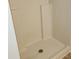 Beige tiled shower stall with built-in shelving at 6075 Shingler Ave, Spring Hill, FL 34608