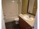 Bathroom with tub, toilet and granite countertop at 5265 E Bay Dr # 420, Clearwater, FL 33764