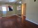 Bright dining area with hardwood floors and a pass-through to kitchen at 5265 E Bay Dr # 420, Clearwater, FL 33764