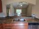 Kitchen with granite counters, double sink, and dishwasher at 5265 E Bay Dr # 420, Clearwater, FL 33764