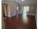Spacious living room featuring hardwood floors and vaulted ceilings at 5265 E Bay Dr # 420, Clearwater, FL 33764