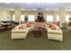 Relaxing community room with comfortable seating and TV at 4516 Seagull Dr # 414, New Port Richey, FL 34652