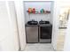 Bright laundry room with washer and dryer in a closet at 4516 Seagull Dr # 414, New Port Richey, FL 34652