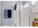 Clean bathroom with a walk-in shower and updated fixtures at 11724 Heritage Point Dr, Hudson, FL 34667