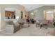 Bright and airy living room with ample natural light and neutral color palette at 11724 Heritage Point Dr, Hudson, FL 34667