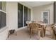 Spacious screened porch with outdoor seating at 11724 Heritage Point Dr, Hudson, FL 34667