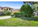 Landscaped front yard with lush greenery at 6316 Spoonbill Dr, New Port Richey, FL 34652