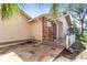 Stone patio with access to the backyard at 6316 Spoonbill Dr, New Port Richey, FL 34652