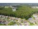 Aerial view of house and surrounding neighborhood at 1153 Dustan Pl, Trinity, FL 34655