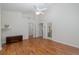 Spacious bedroom with wood flooring, ceiling fan and access to patio at 1153 Dustan Pl, Trinity, FL 34655