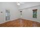 Bright bonus room with hardwood floors and backyard access at 1153 Dustan Pl, Trinity, FL 34655