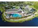 Community clubhouse with pool and patio area at 1153 Dustan Pl, Trinity, FL 34655