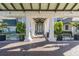 Grand entrance to community with columns and landscaping at 1153 Dustan Pl, Trinity, FL 34655