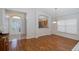 Dining room with hardwood floors and kitchen views at 1153 Dustan Pl, Trinity, FL 34655