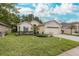 Single-Gathering home with attached garage and lush lawn at 1153 Dustan Pl, Trinity, FL 34655