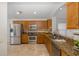 Modern kitchen with stainless steel appliances and granite countertops at 1153 Dustan Pl, Trinity, FL 34655