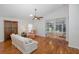 Living room with hardwood floors and access to a sunroom at 1153 Dustan Pl, Trinity, FL 34655