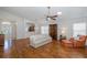 Spacious living room with hardwood floors and sunroom access at 1153 Dustan Pl, Trinity, FL 34655