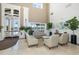 Spacious community clubhouse lobby with seating area at 1153 Dustan Pl, Trinity, FL 34655