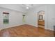 Main bedroom with hardwood floors and en-suite bathroom at 1153 Dustan Pl, Trinity, FL 34655