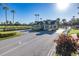 Community entrance with guardhouse and lush landscaping at 1153 Dustan Pl, Trinity, FL 34655