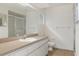 Clean bathroom, featuring a large vanity and shower at 9410 Fox Hollow Ln, Weeki Wachee, FL 34613
