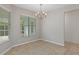 Bright breakfast nook with tile floors and window seating at 9410 Fox Hollow Ln, Weeki Wachee, FL 34613
