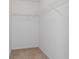 Walk-in closet with wire shelving at 9410 Fox Hollow Ln, Weeki Wachee, FL 34613