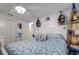 Bright bedroom with nautical decorations, a comfortable queen bed, and plenty of storage space at 3178 Sea Grape Dr, Hernando Beach, FL 34607