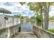 A concrete boat ramp leading to the water with lush greenery at 3178 Sea Grape Dr, Hernando Beach, FL 34607